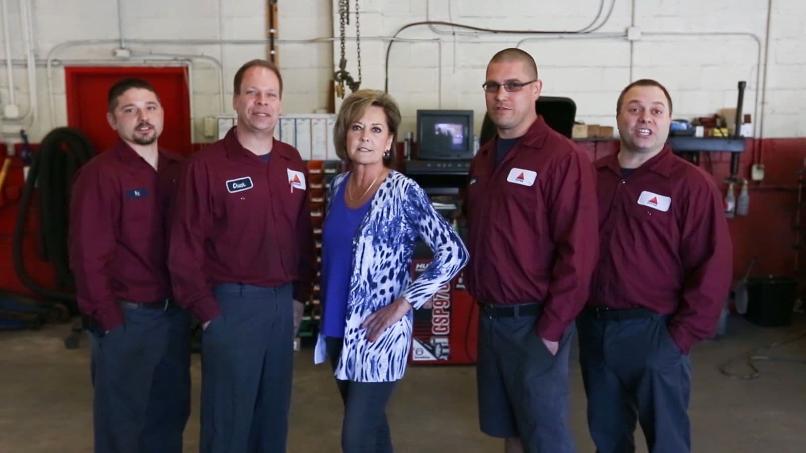 The Sitko's crew in the service bay