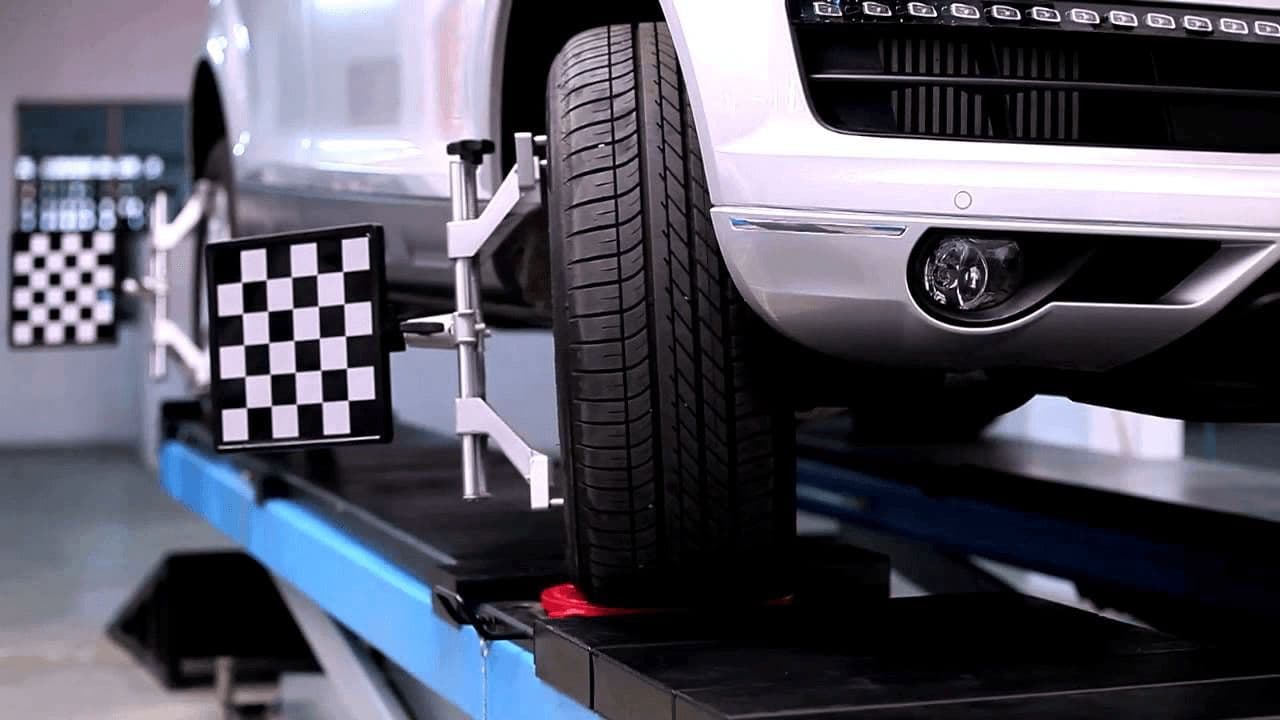 Wheel alignment rig on a vehicle lift